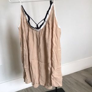 Beige, navy and white flowy shirt with Poms. Never worn, perfect condition.
